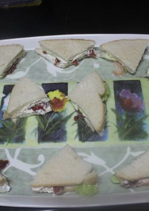 Foto principal de Triángulos de pan de molde con jamón y queso