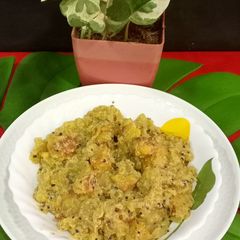 A picture of Peper (Raw Papaya) shukto.