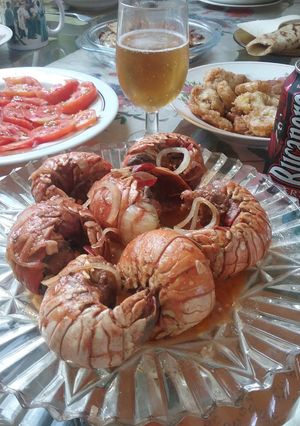 Una foto de Langosta al ajillo