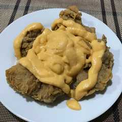 A picture of Boneless cheesy chicken.