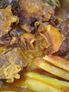 عکسی از دستور چلو گوشت با دم گاو