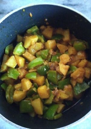 A picture of Shimla mirch with aloo ki bhujia.