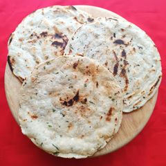 A picture of Maize Flour Masala Rotlo/Makki di Roti/ Flatbread.