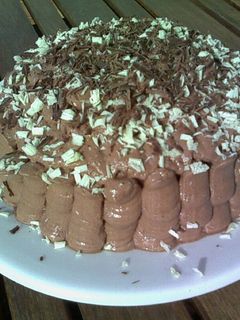 Una foto de Tarta tres chocolates