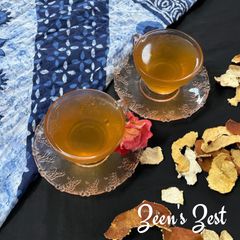 A picture of Orange peels and Coconut Jaggery Tea.