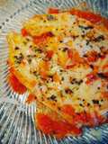 Pollo con ciliegini e scaglie