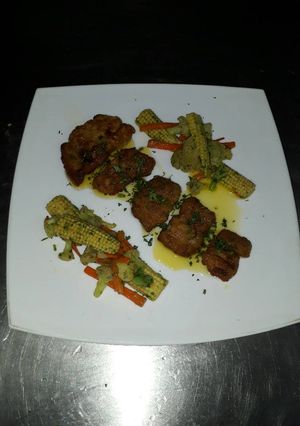 A picture of Fish meuniere with saute vegetables.
