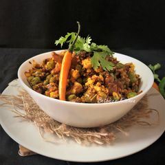 A picture of Paneer Matar Bhurji (Scrambled Cottage Cheese with Green Peas).