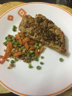 A picture of Grilled chicken with Salad.