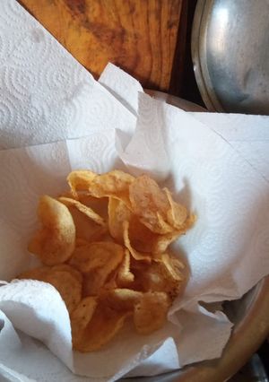Una foto de Papas fritas con mandolina