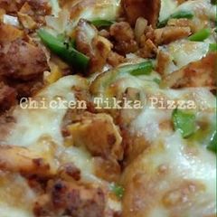 Chicken tikka pizza A picture of Chicken tikka pizza.