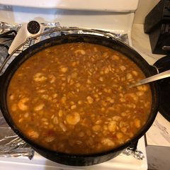 A picture of Cajun butter beans an shrimp.