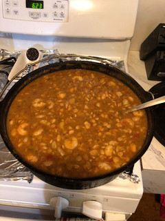 A picture of Cajun butter beans an shrimp.