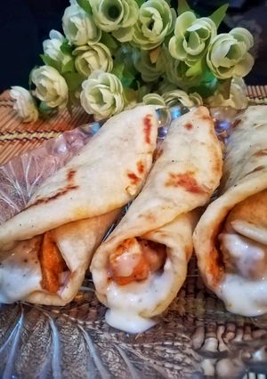 A picture of Chicken Tikka cheese rolls.