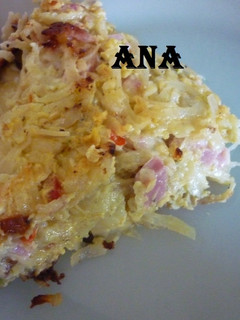 Una foto de Tortilla de papas ralladas rellena