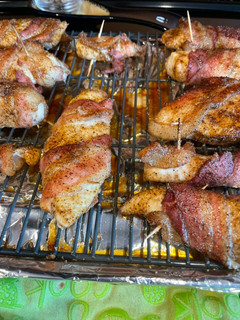 A picture of Bacon wrapped chicken.