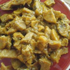 A picture of Unripe plantain with dry fish.
