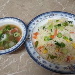 A picture of Vegetable fried rice with chicken chillies.