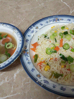 A picture of Vegetable fried rice with chicken chillies.