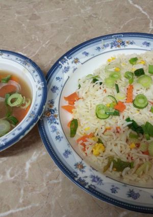 A picture of Vegetable fried rice with chicken chillies.