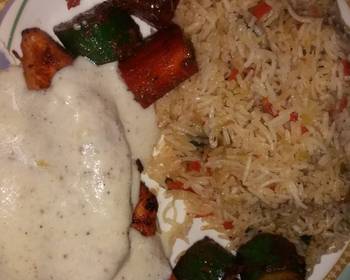 The New Way Prepare Recipe Grilled chicken with tarragon sauce served with fried rice Home Style