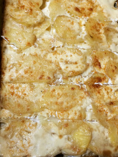 Una foto de Papas a la crema gratinadas