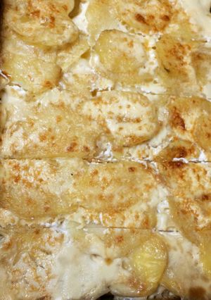 Una foto de Papas a la crema gratinadas