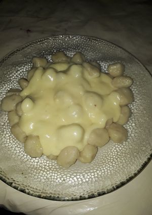 Una foto de Ñoquis de papa con salsa 4 quesos