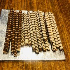A picture of Chocolate cigars.