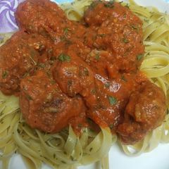 A picture of Teftini, Beef over Fettuccine.