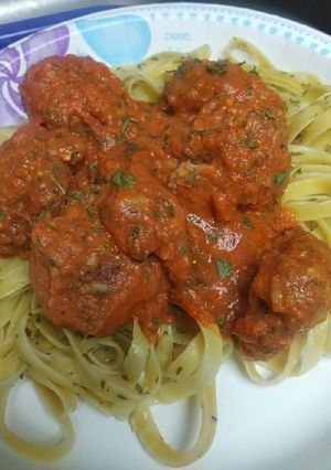 A picture of Teftini, Beef over Fettuccine.