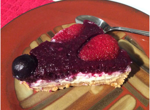 Una foto de Pie (tarta) de queso con frutos rojos