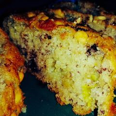 A picture of Banana Bread with Chocolate Chip Streusel with Cream Cheese Filling.