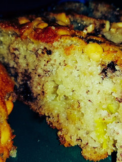 A picture of Banana Bread with Chocolate Chip Streusel with Cream Cheese Filling.