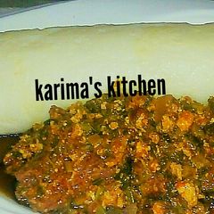 A picture of Pounded yam/vegetable soup.