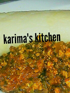 A picture of Pounded yam/vegetable soup.