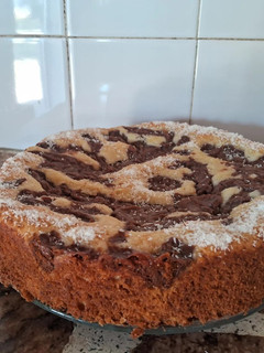 Una foto de Torta matera con crema pastelera de chocolate🍫