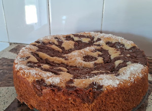 Una foto de Torta matera con crema pastelera de chocolate🍫