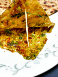 A picture of Methi Matar Parantha/ Peas fenugreek pancake.