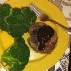 A picture of Healthy Pancakes with steamed broccoli.