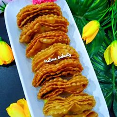 A picture of Star Fruit Shaped Sweet Khaja.
