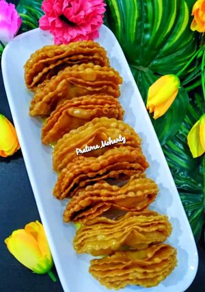 A picture of Star Fruit Shaped Sweet Khaja.
