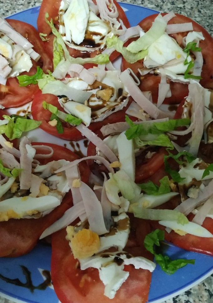 Una foto de Tomate con queso de cabra