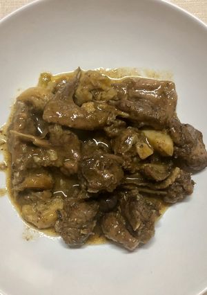 Una foto de Conejo con ajos al coñac