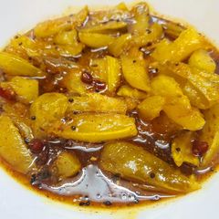 Aamer Tok Jhaal Misti Achar or Sweet,Sour and Spicy Mango Pickle A picture of Aamer Tok Jhaal Misti Achar or Sweet,Sour and Spicy Mango Pickle.
