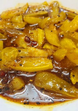 A picture of Aamer Tok Jhaal Misti Achar or Sweet,Sour and Spicy Mango Pickle.