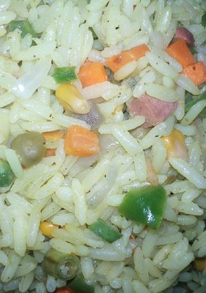 A picture of Fried rice with pepper chicken.