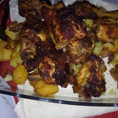 Baked chicken in veggies A picture of Baked chicken in veggies.