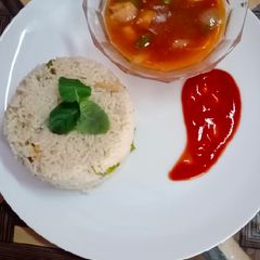 A picture of Shashlik with white rice.