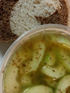 A picture of Vinegar, Bread, and Cucumbers.